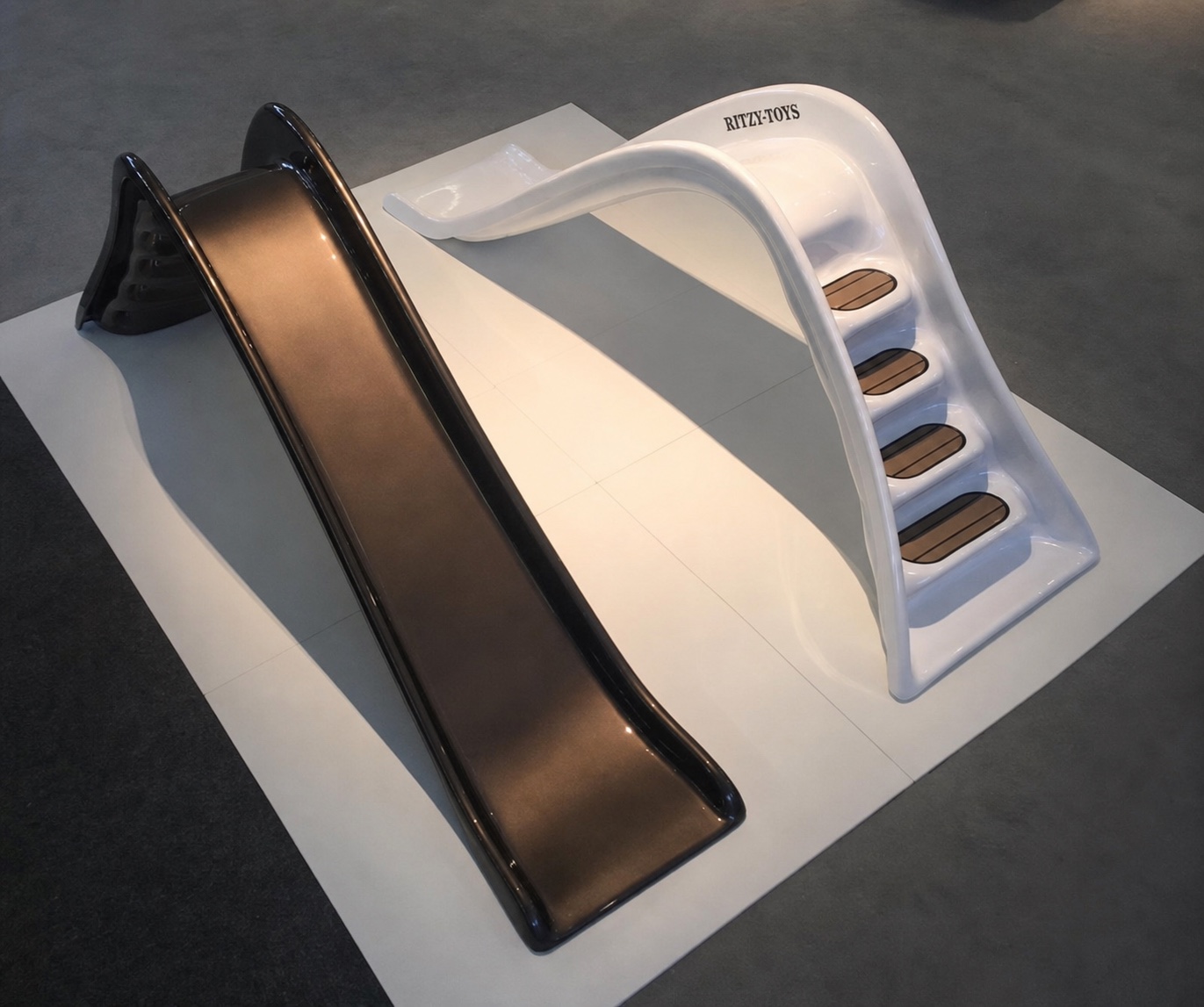 Two Ritzy-Slide finishes displayed together in Amsterdam